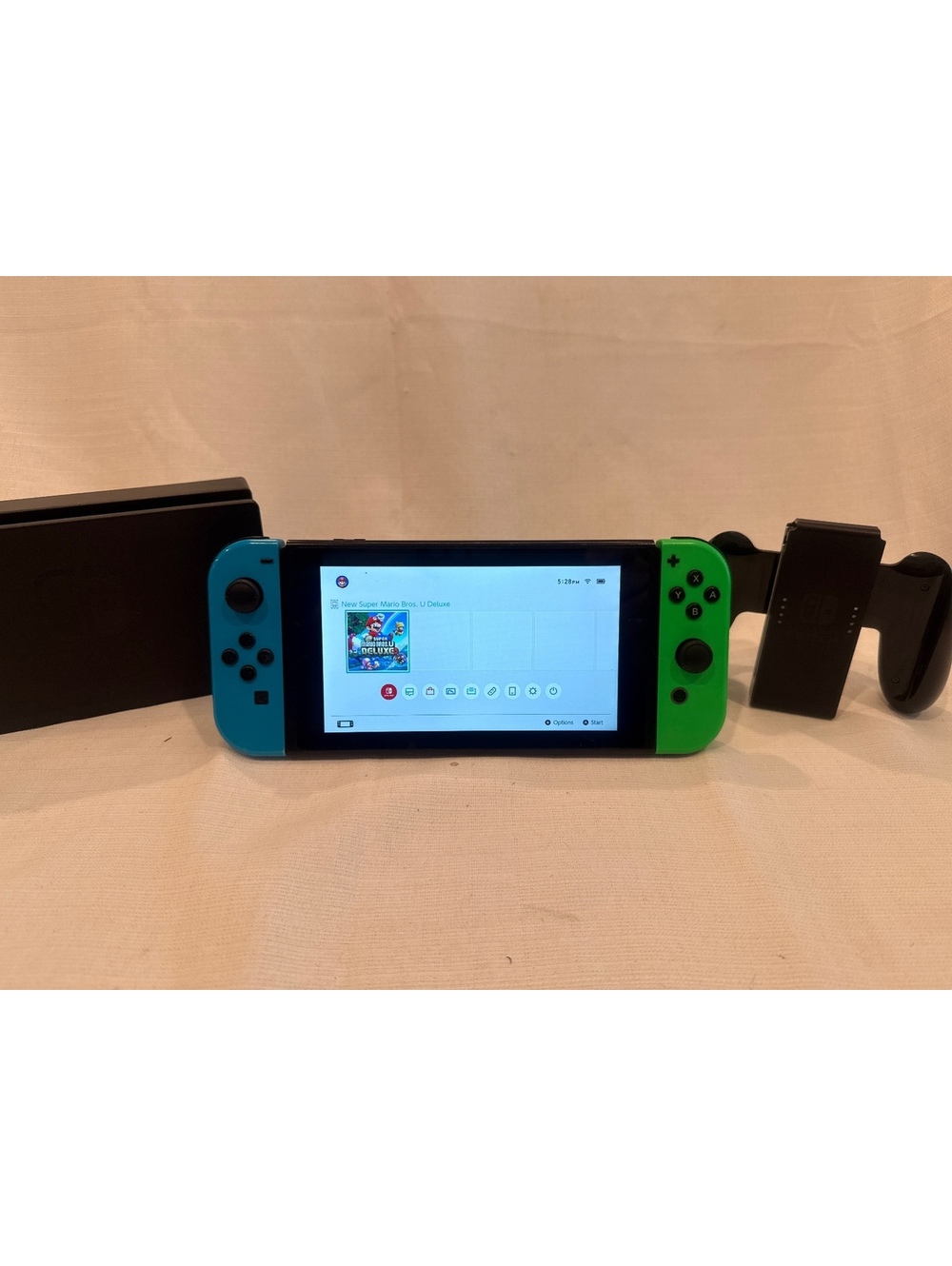Nintendo Switch Console with Neon Joy-Con Controllers and Super Mario Bros. U
